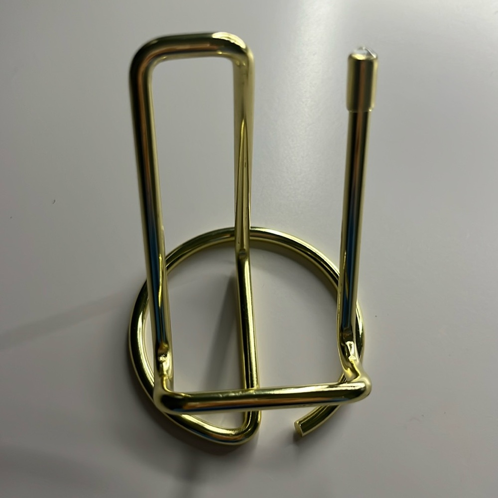 Gold phone holder.